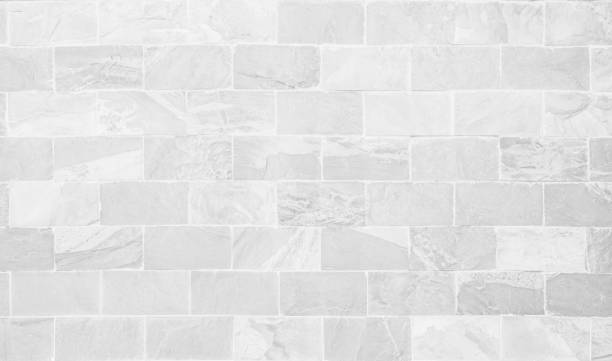 istock White grunge brick wall texture background for stone tile block painted in grey light color wallpaper modern interior and exterior and room backdrop design. Simple seamless pattern grid for backdrop. 1451064365