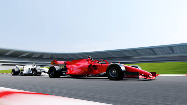 istock red race car leading on a race track 1451065902