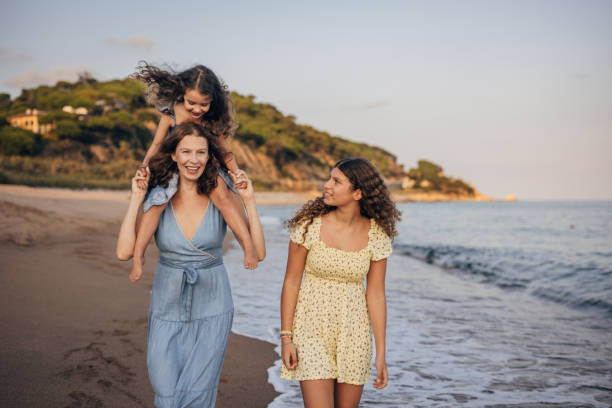 istock Mom and daughters on vacation 1451074219