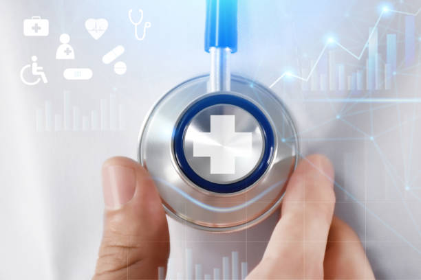 healthcare and medicine. health insurance concept. healthcare business finance data graphs and growth. stethoscope and health icons with business graphs - growth global business global communications healthcare and medicine imagens e fotografias de stock