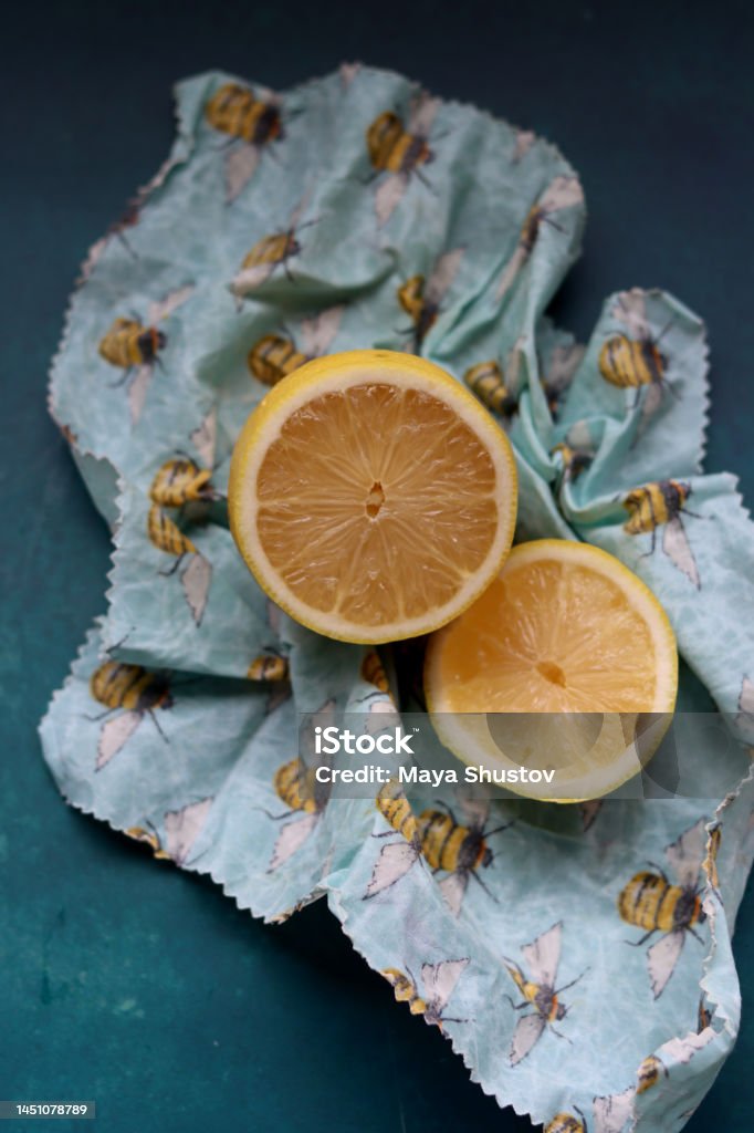 Beeswax wrap Lemon on beeswax food wrap. Reusable sustainable wrap. Environment friendly alternative of plastic. Alternative Lifestyle Stock Photo