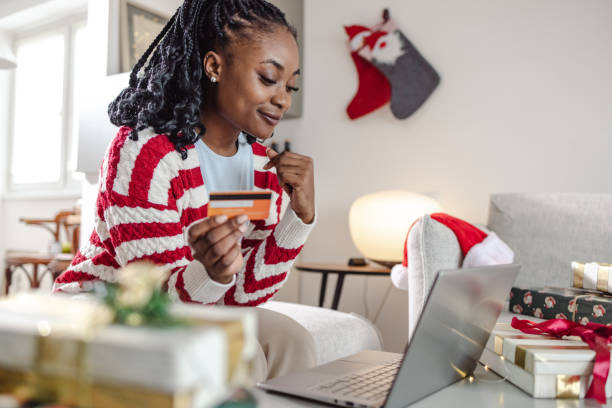istock Online Christmas shopping at home 1451079425