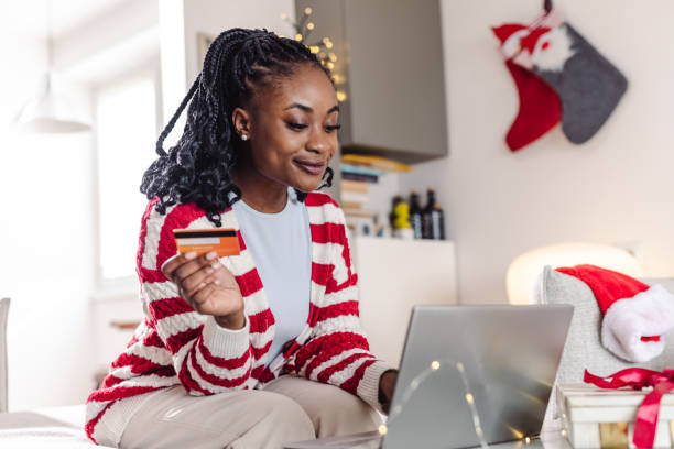 istock Online Christmas shopping at home 1451080067