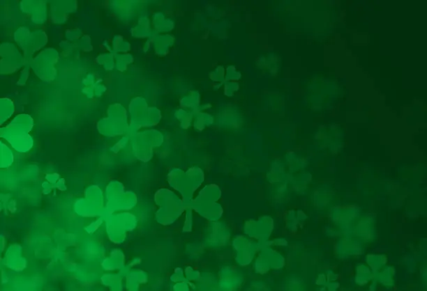 Vector illustration of Four-Leafed Clover Shamrock St. Patrick's Day Textured Green Background