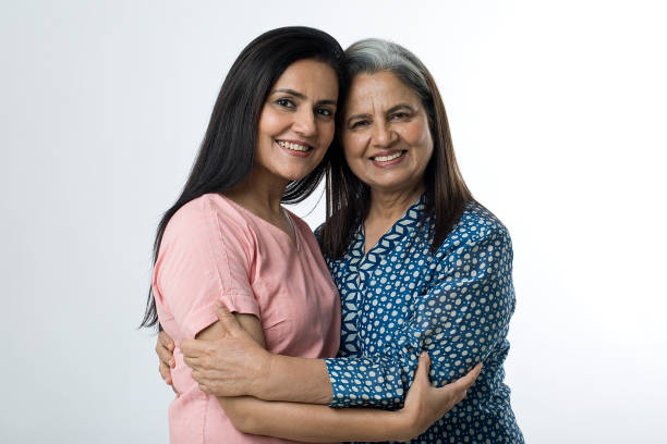 istock Happy mother and daughter embracing each other 1451083881