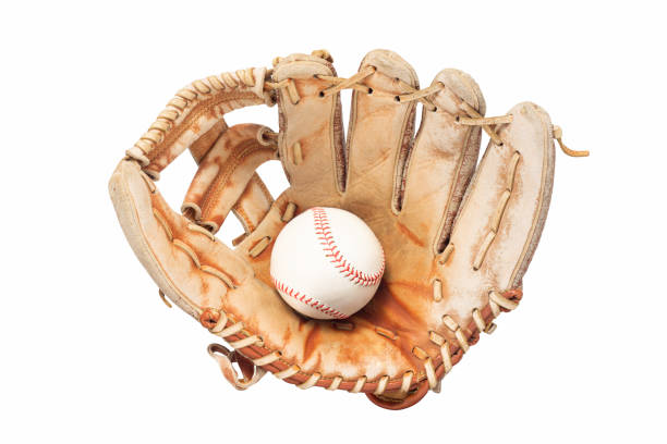 istock Old leather base ball glove with ball isolated on white with clipping path 1451086866