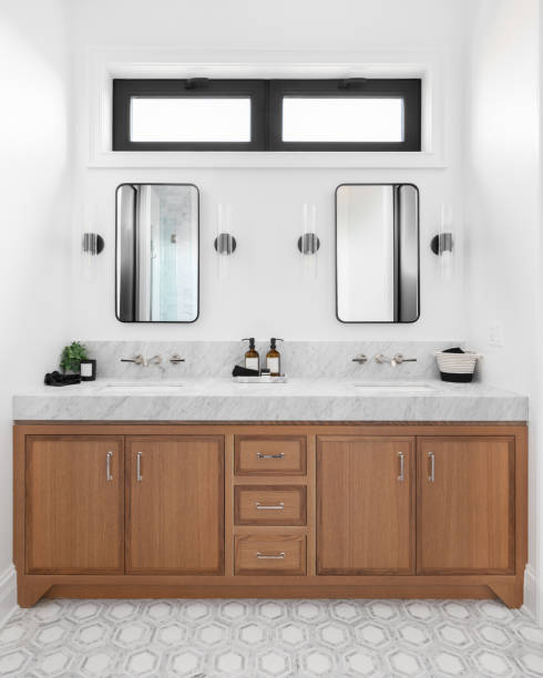 istock A beautiful bathroom with a wood cabinet and tiled floor. 1451086975