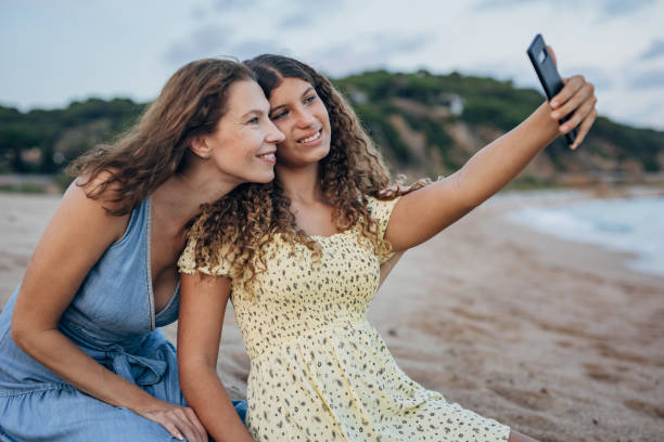 istock Mother and daughter selfie 1451088396