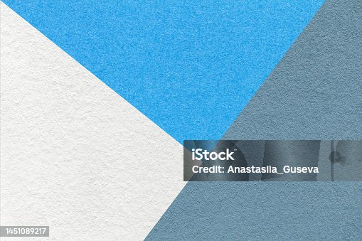 istock Texture of craft white, blue and cool gray shade color paper background, macro. Vintage abstract cerulean cardboard 1451089217