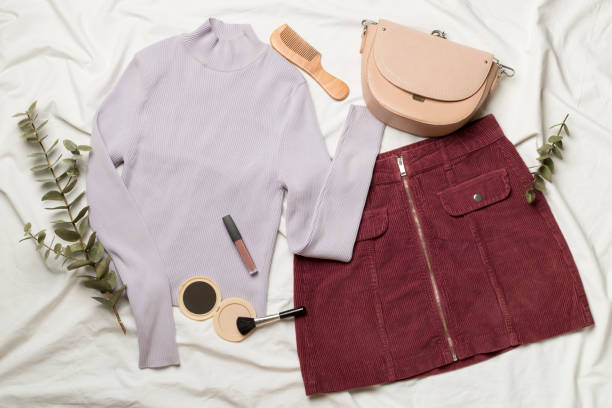 istock Flat Lay with women casual outfit on white sheet, top view 1451089324