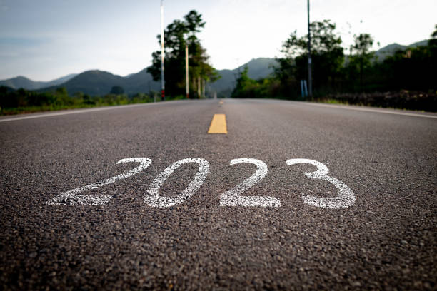 istock The word 2023 is written on an empty road. 1451090447