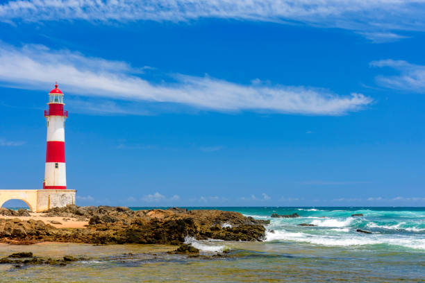 istock Lighthouse on the sands of Itapua beach 1451093318