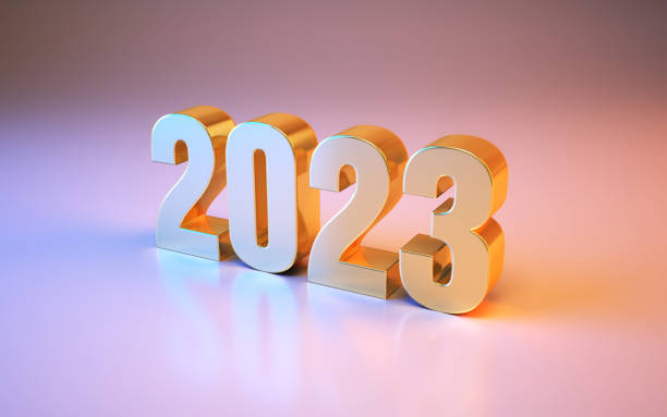 istock New Year 2023 Sitting on Metallic Blue and Pink Background 1451093579