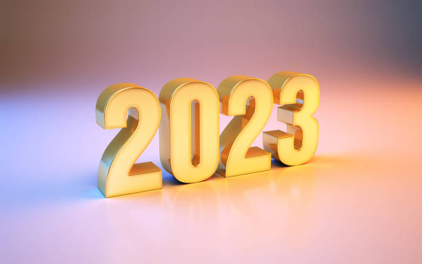 istock New Year 2023 Sitting on Metallic Blue and Pink Background 1451093743