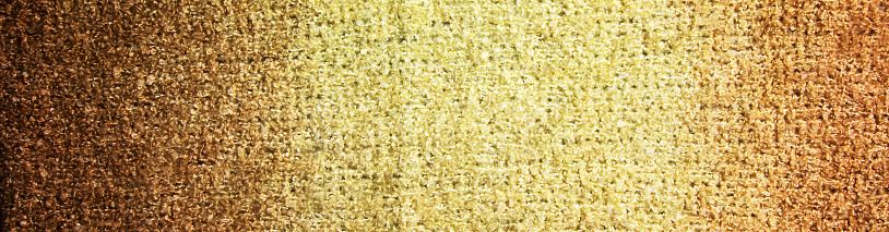 Knitted wool textile textured background in light beige creamy brown shade. Beige color gradient on texture background.