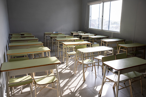 Interior of an empty school classroom - education concepts