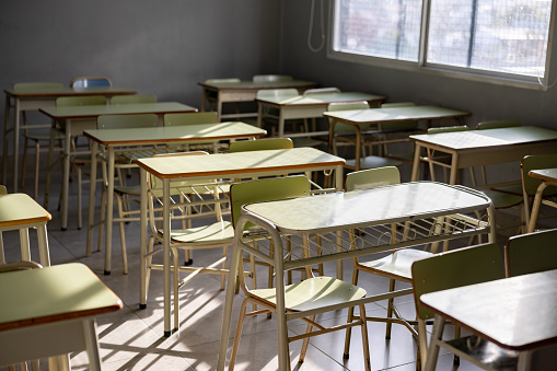 Interior of an empty school classroom - education concepts
