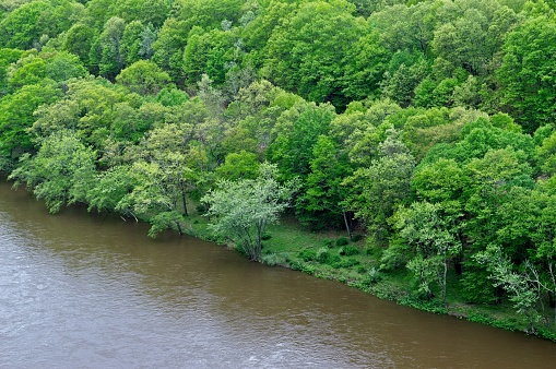 The banks of the Delaware river looking into Pennsylvania from New York. Along the Delaware water gap national recreation area, an water resource and recreation opportunity between New York and Pennsylvania.