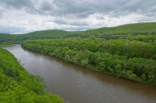 The banks of the Delaware river looking into Pennsylvania from New York. Along the Delaware water gap national recreation area, an water resource and recreation opportunity between New York and Pennsylvania.