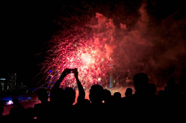 istock Tourists celebrate at the daily Niagara Falls firework display 1451107703