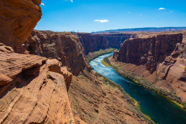 Aerial view overlooking the Colorado River inside the Grand Canyon. Seen at day near the city of Page, Arizona, USA.