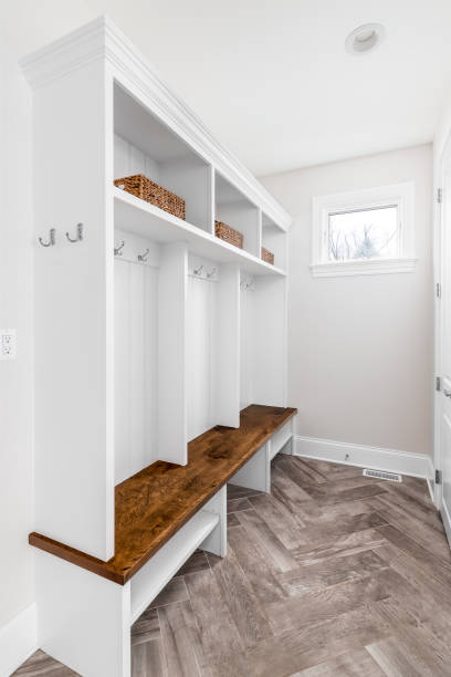 istock A farmhouse mud room/foyer with a herringbone tiled floor. 1451110207