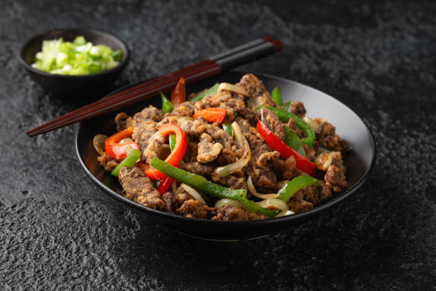 istock Crispy Salt and Pepper Beef in black bowl 1451115204