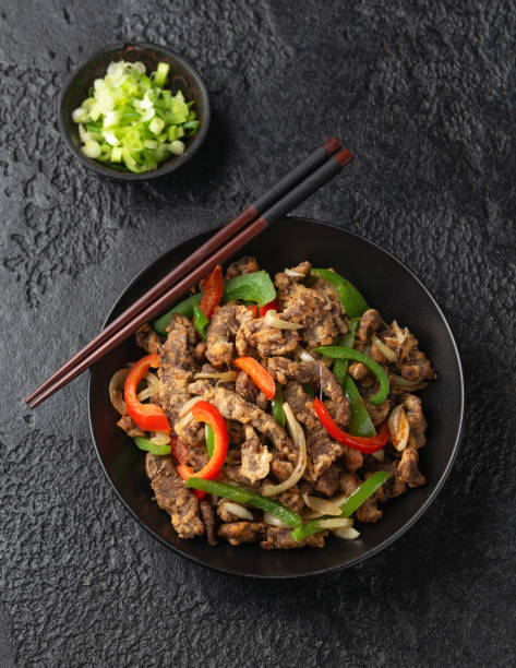 istock Crispy Salt and Pepper Beef in black bowl 1451115764