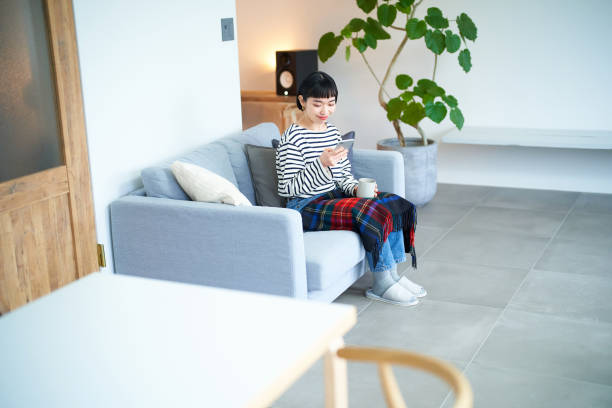 istock Young woman operating a smartphone 1451118546