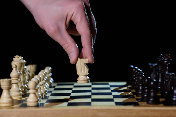 istock Chess.Chess piece knight in a man's hand 1451121022