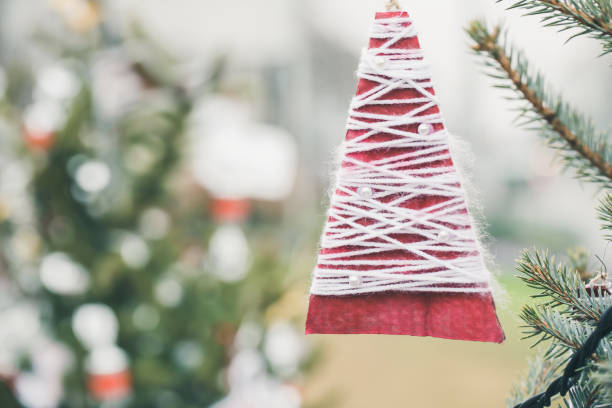 istock DIY yarn and paper decoration on Christmas tree 1451121801