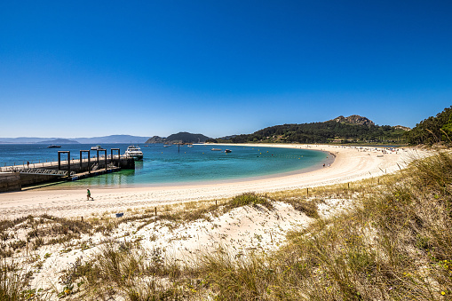 Beach of Rodas in Cies Islands nature reserve, white sand and clear turquoise water. Atlantic Islands of Galicia National Park, Spain.