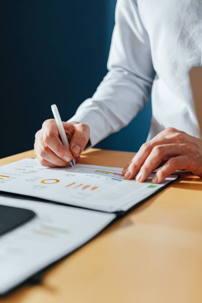 istock Unrecognizable Businessman Working At Home 1451134592