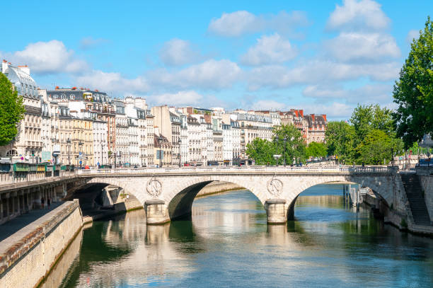 Paris cityscape : Saint Michel bridge on Seine River stock photo
