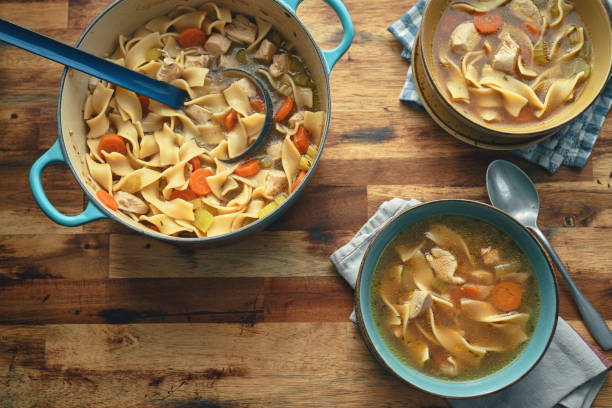 istock Chicken Noodles Soup with Fresh Vegetables 1451138090