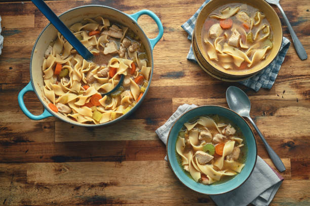 istock Chicken Noodles Soup with Fresh Vegetables 1451138091