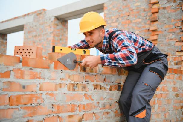 istock Construction worker in uniform and safety equipment have job on building 1451138257