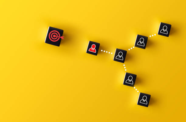 istock work together with one's team members toward one's goal 1451138360