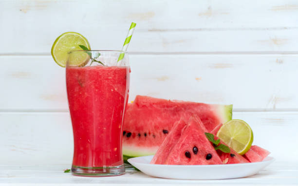istock Watermelon Smoothie In A Jar With Mint And Lemon 1451140777