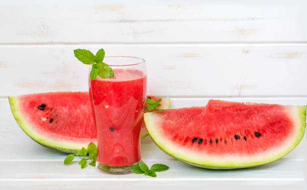 istock Watermelon Smoothie In A Jar With Mint And Lemon 1451140783
