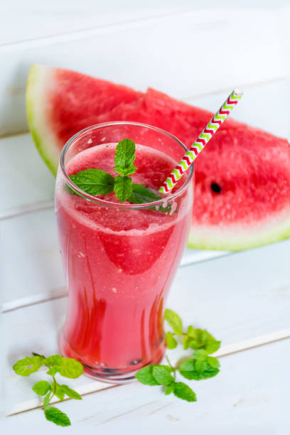 istock Watermelon Smoothie In A Jar With Mint And Lemon 1451140794