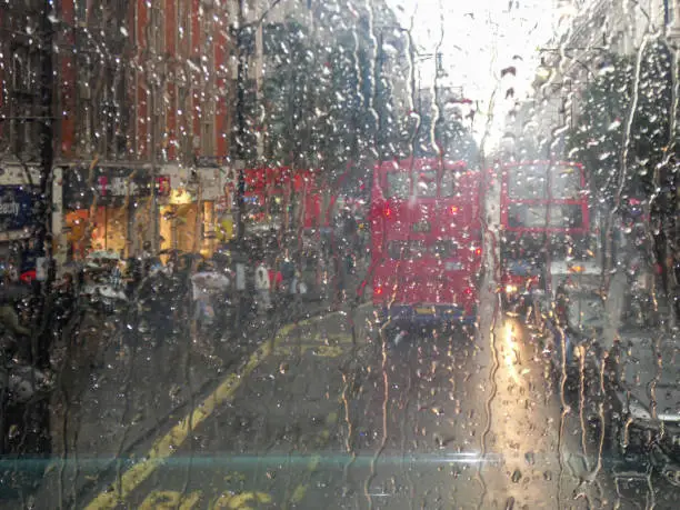Photo of A London street view through a wet glass