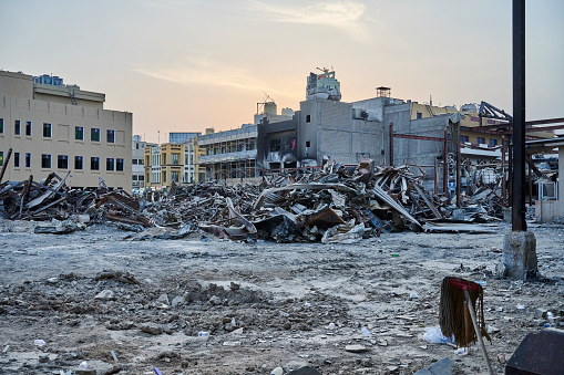 Kuwait City - 06 June 2022: rubble and debris at the site of the fire that devastated the Mubarakiya durra al-kuwait market on March 31st 2022.