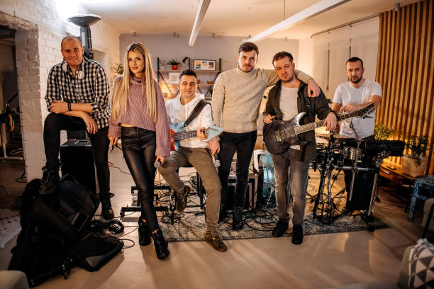 Portrait of the band looking at the camera