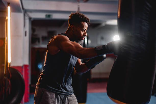 istock Determined Mixed Race Male Boxer Training For A Competition 1451147371