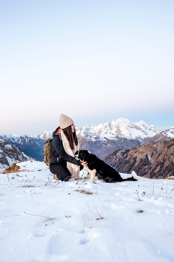Woman Hiker Talking with her Dog