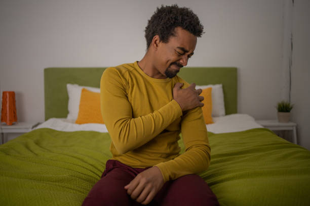istock Young man suffering from pain 1451150064