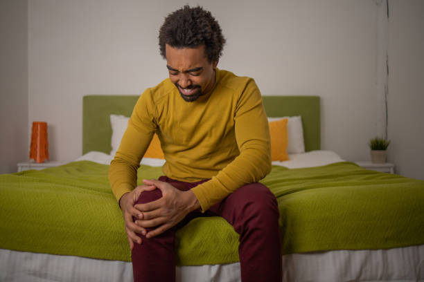 istock Young man suffering from pain 1451150072
