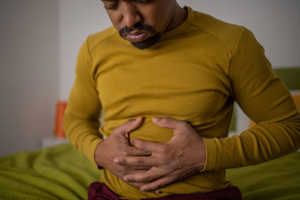 istock Young man suffering from pain 1451150092