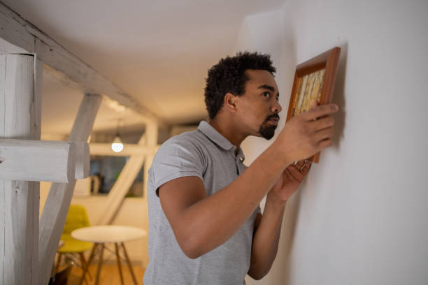 istock Young man moves into a new apartment 1451151086